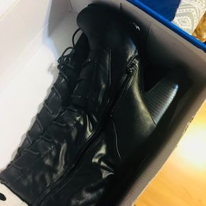 Black tall lace up black boots